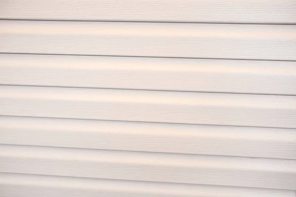 Parte Nueva Pared Revestimiento Beige Con Largos Detalles Horizontales Paralelos — Foto de Stock