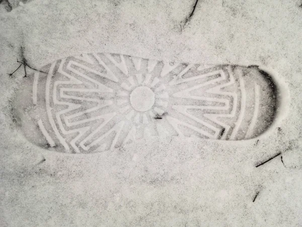 human footprints in the snow, footprints in the snow