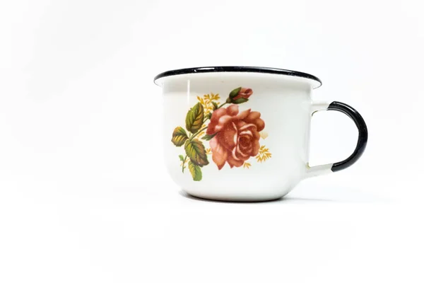 white iron cup on a white background