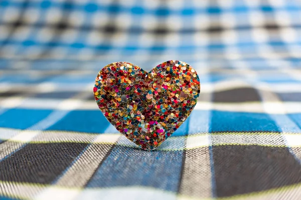 beautiful small heart on blue checkered shirt