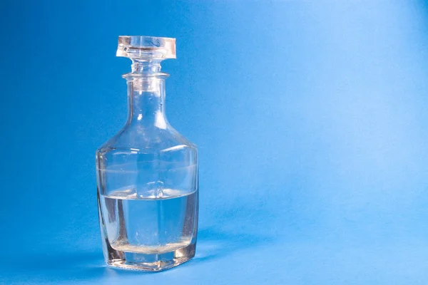 Glass Bottle Liquid Blue Background — Stock Photo, Image