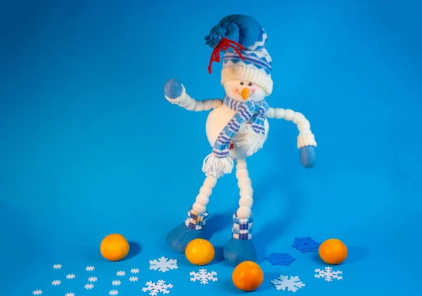 Big Toy Snowman Blue Background — стоковое фото