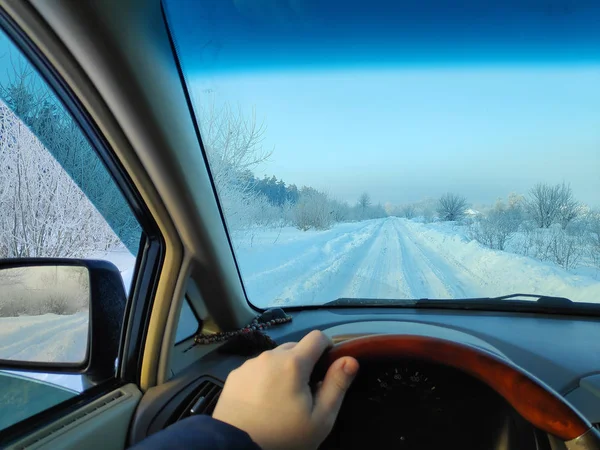 driving in a car on a winter road, winter road, inside a car, a lot of snow