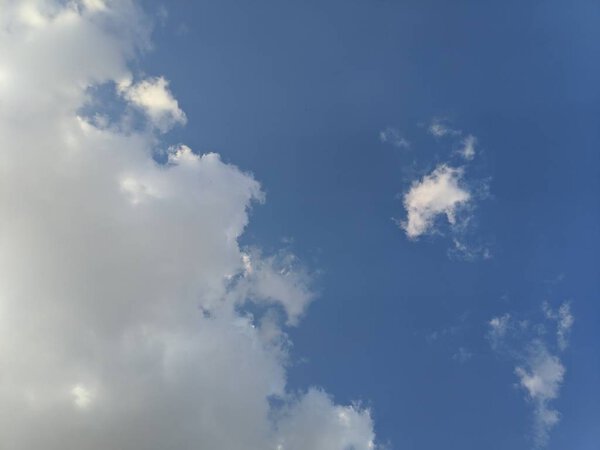 beautiful white clouds against blue sky