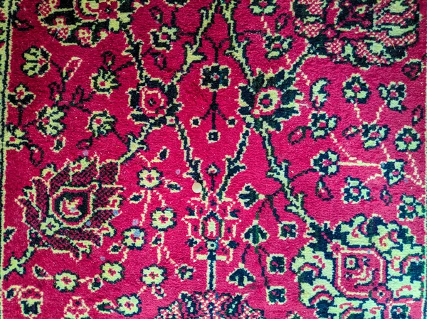 vintage carpet. patterns on the carpet. hand-embroidered carpet