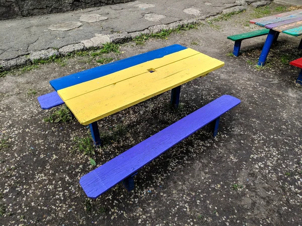 colored wooden furniture, street benches and table, children\'s furniture