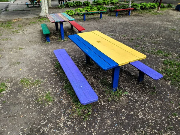 colored wooden furniture, street benches and table, children's furniture