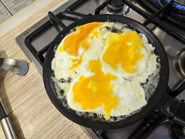 scrambled eggs in the pan. cooking scrambled eggs