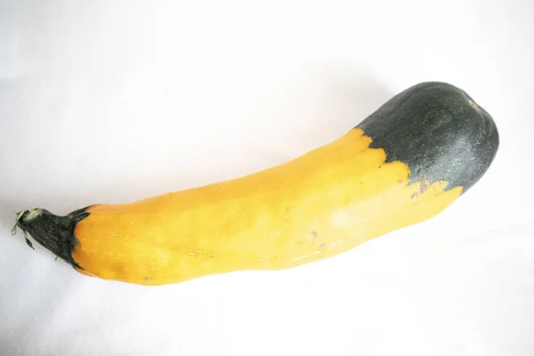 yellow zucchini on a white background. two-color zucchini.