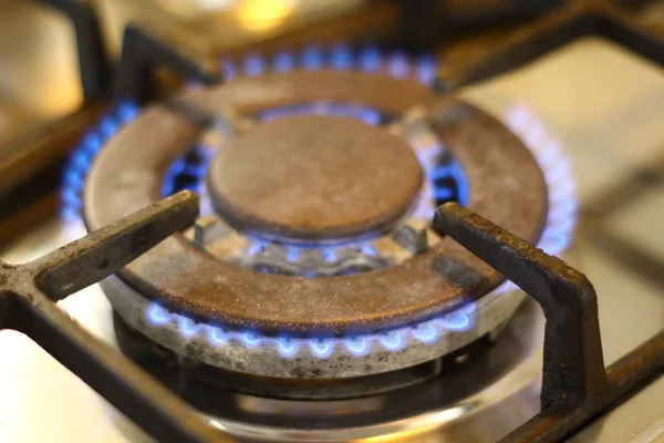 blue flame of gas. gas stove. natural gas burning.