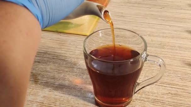 透明なカップでお茶 — ストック動画