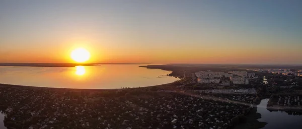evening landscape with sunset. river and sun from above. landscape on a summer evening with a drone