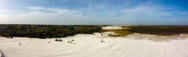 landscape with white sand. white quartz sand. dunes and desert brahans