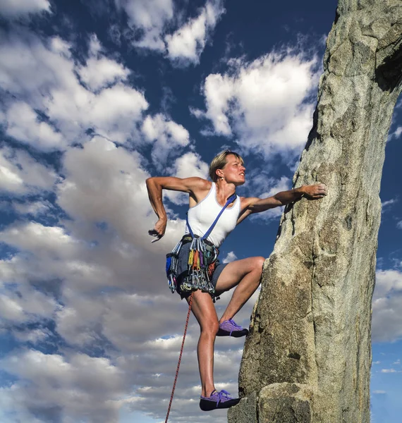 Climber on the edge. Royalty Free Stock Images
