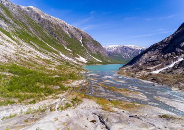 Nigardsbreen buzul Nigardsvatnet Jostedalsbreen Ulusal parkında güneşli bir Norveç'te yakınındaki havadan görünümü