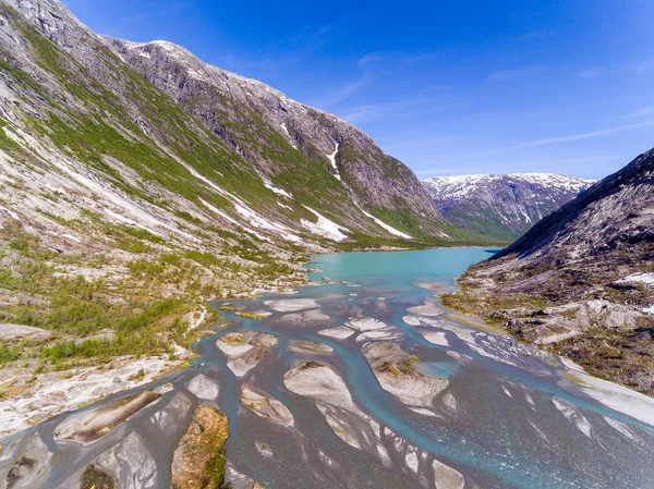 Nigardsbreen buzul Nigardsvatnet Jostedalsbreen Ulusal parkında güneşli bir Norveç'te yakınındaki havadan görünümü