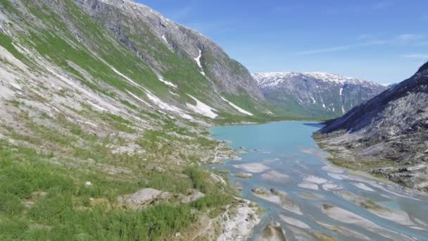 Εναέρια άποψη κοντά στο παγετώνας Nigardsbreen στο Nigardsvatnet Jostedalsbreen εθνικό πάρκο στη Νορβηγία σε μια ηλιόλουστη μέρα — Αρχείο Βίντεο