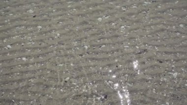 Güzel yavaş hareket okyanus yüzeyinin, sessizce bir dalga sallayarak