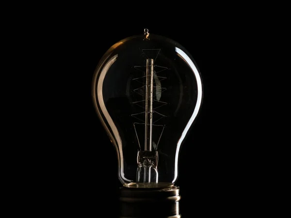 Edisons лампочка освещает от электрического тока — стоковое фото