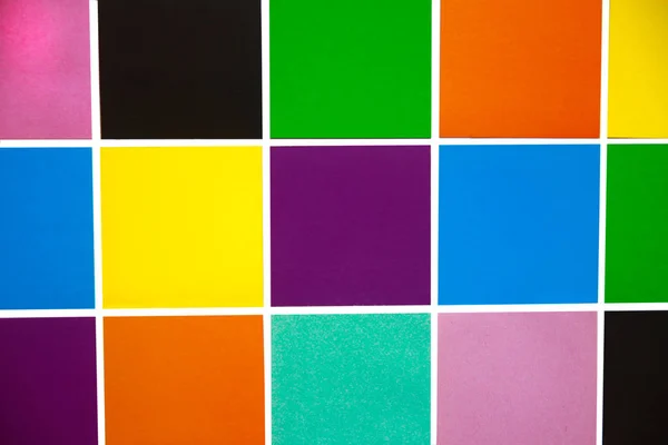 異なる色の正方形からの背景 — ストック写真