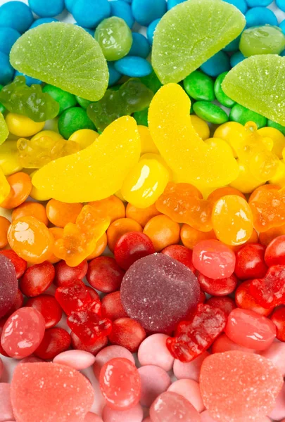 Background of mixed colorful candies. Color sweets texture