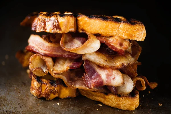 Rustic english bacon butty sandwich — Stock Photo, Image