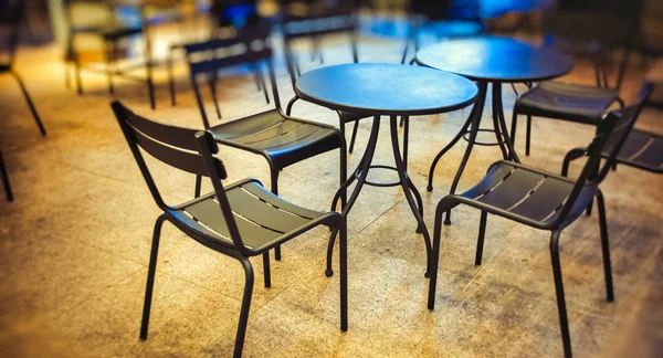 Al fresco restaurant table and chairs — Stock Photo, Image