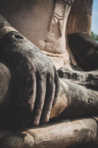Close up of Buddha statue hand at Ayutthaya, ancient city in Thailand