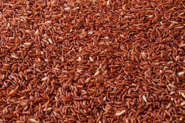 Arka Plan Olarak Kahverengi Pirinç Pişmemiş — Stok fotoğraf