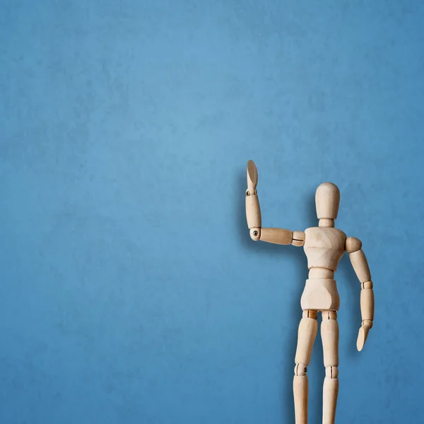 Wooden Mannequin Posing Blue Background — Stock Photo, Image