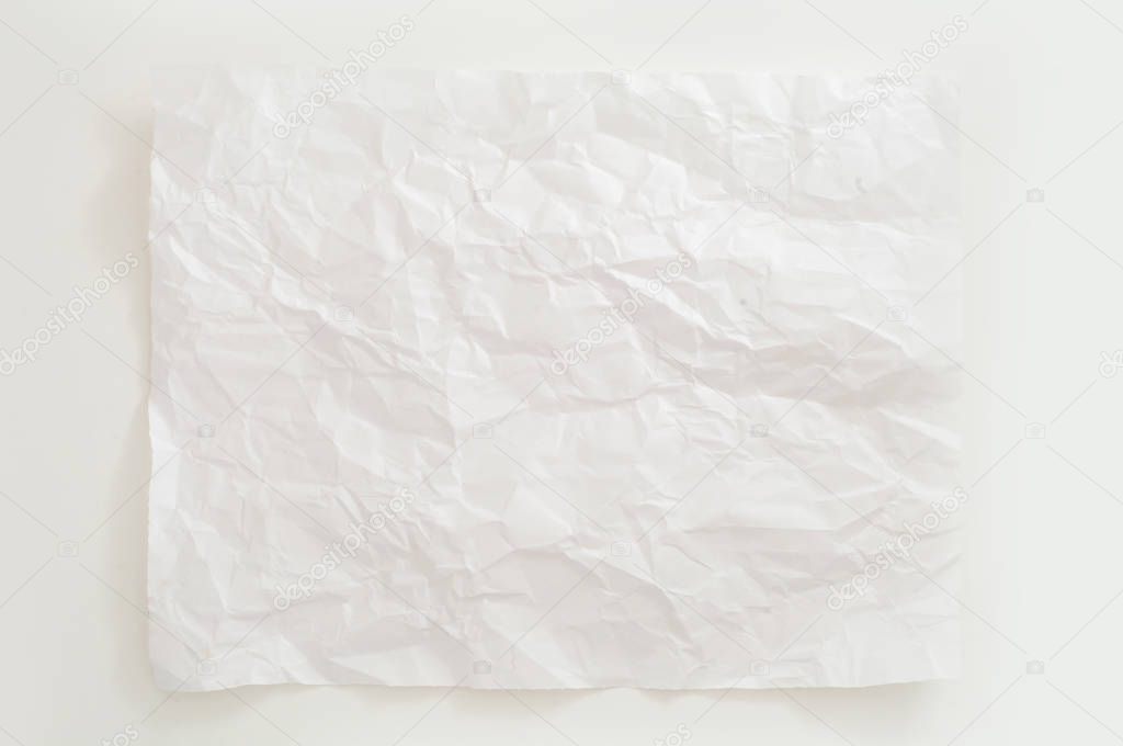 crumpled white sheet on white background