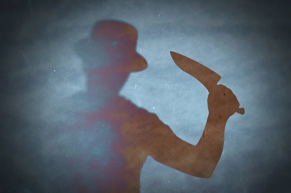 Mavi Zemin Üzerine Bıçakla Cinayet Silüeti — Stok fotoğraf