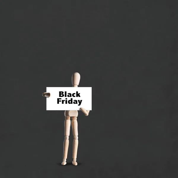 Wooden Mannequins Holding Border Words Black Friday Dark Background — Stock Photo, Image