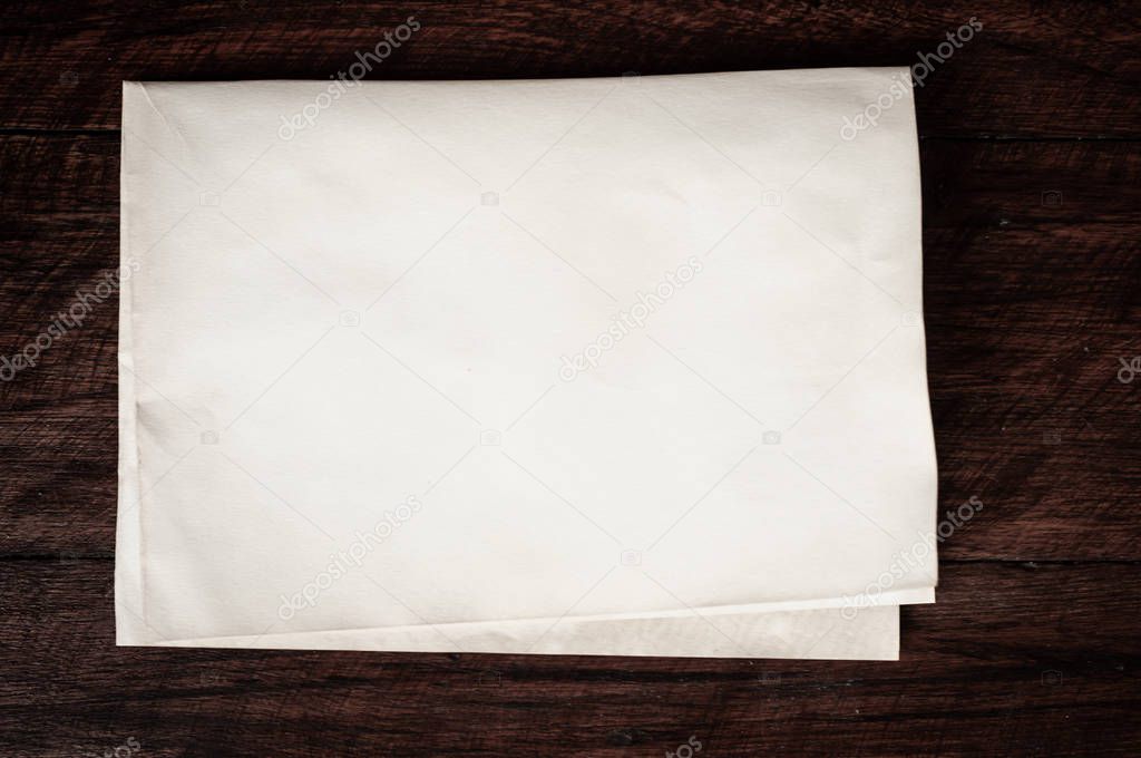 Background texture of crumpled aged paper with spot and stain