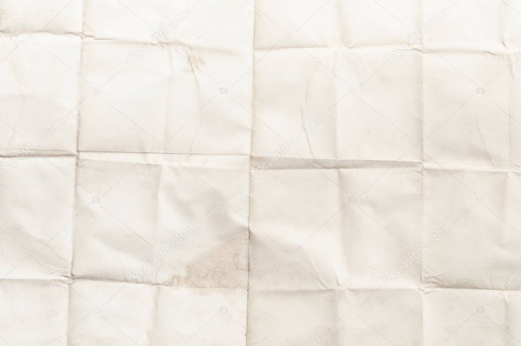 Background texture of crumpled aged paper with spot and stain