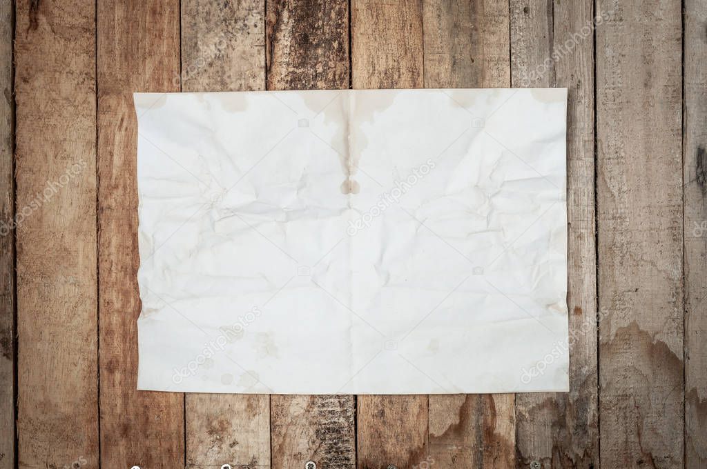 Vintage Crumpled paper texture on wooden table