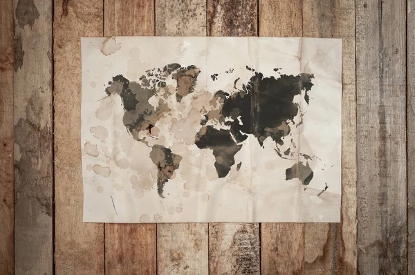 Vintage Crumpled Paper Texture Abstract World Map Wooden Table — Stock Photo, Image