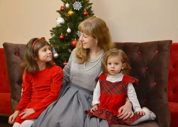 Young Woman Two Girls Sit Background New Year Tree — Stock Photo, Image