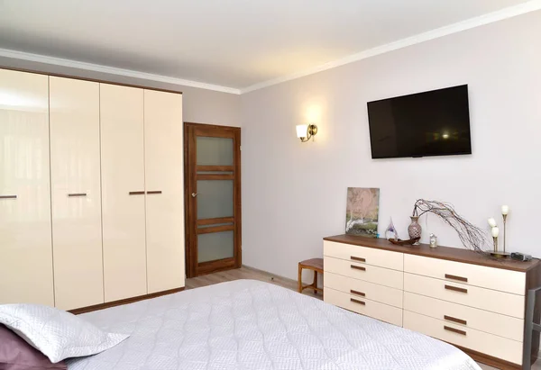 Situation of the modern bedroom. Interior