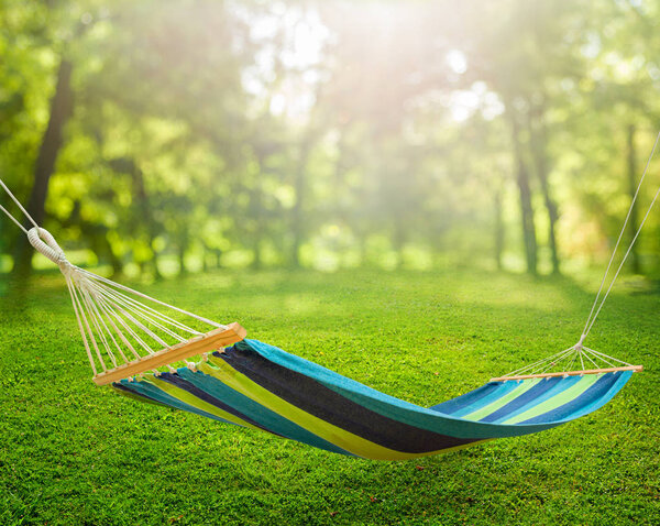 Relaxing on hammock in garden