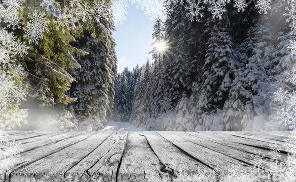 wooden table and winter snow forest landscape with snowflakes