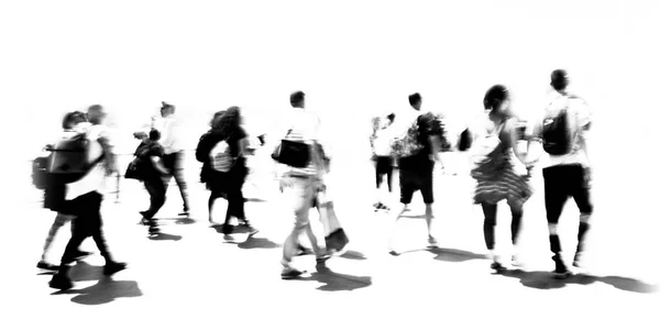 A crowd of anonymous blurred people walking on street — Stock Photo, Image