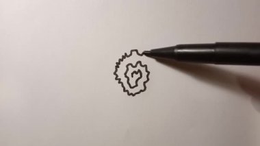 Bir sarmal siyah çiçek astar çizim işlemi. Video klip siyah-beyaz grafik.