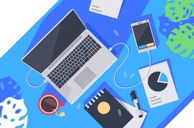 Dizüstü bilgisayar, çay, dizüstü bilgisayar, cep telefonu ve diyagram düz masaüstü Üstten Görünüm.