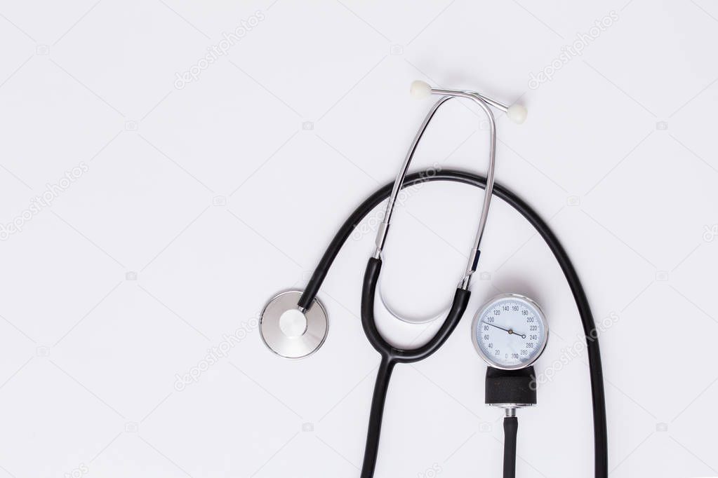 Medical Blood Pressure device. Medical and hospital concept. Stethoscope on white background. phonendoscope for doctor. Stethoscope bright background. Close up equipment medical Stethoscope.