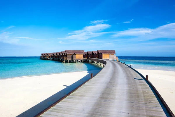 Wooden villas over water of the Indian Ocean, Maldives