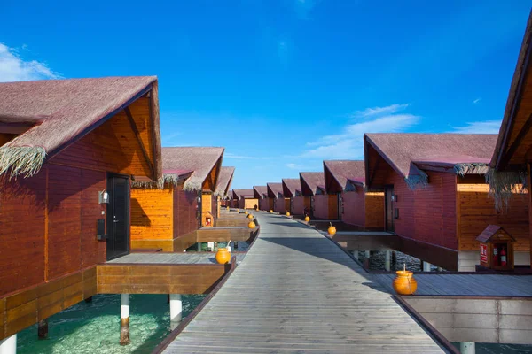 Wooden villas over water of the Indian Ocean, Maldives