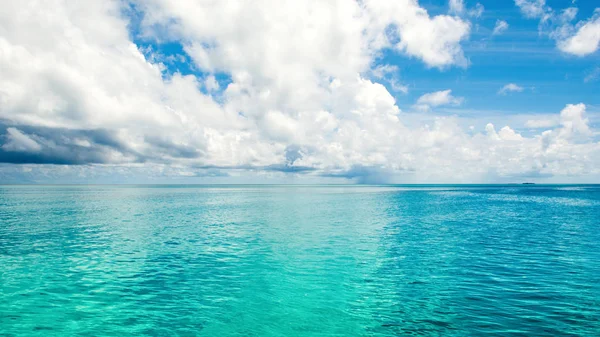 Beautiful landscape of clear turquoise Indian ocean, Maldives islands