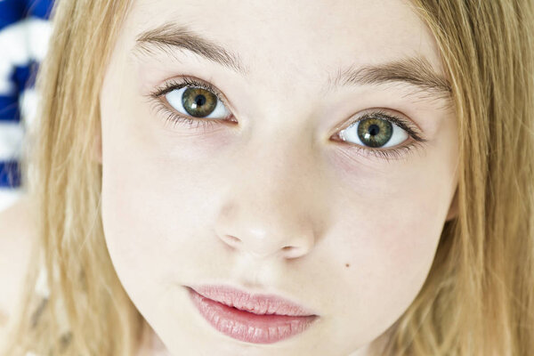Cute teenager girl with big green eyes