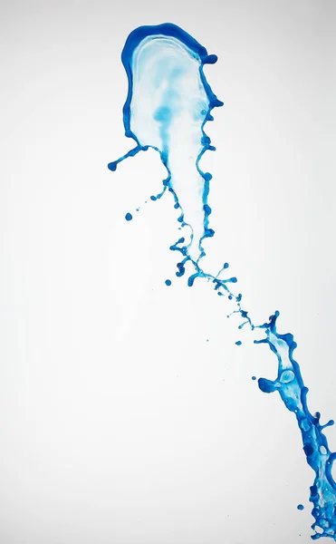 Water splash with a lot of drops on a gray background — Stock Photo, Image